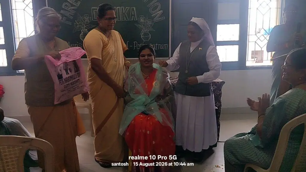 Farewell felicitation ceremony for Ms. Devika Alwar at St. Ann's Convent School, Pathapatnam, showing school leaders honoring her with a ceremonial shawl and gift.
